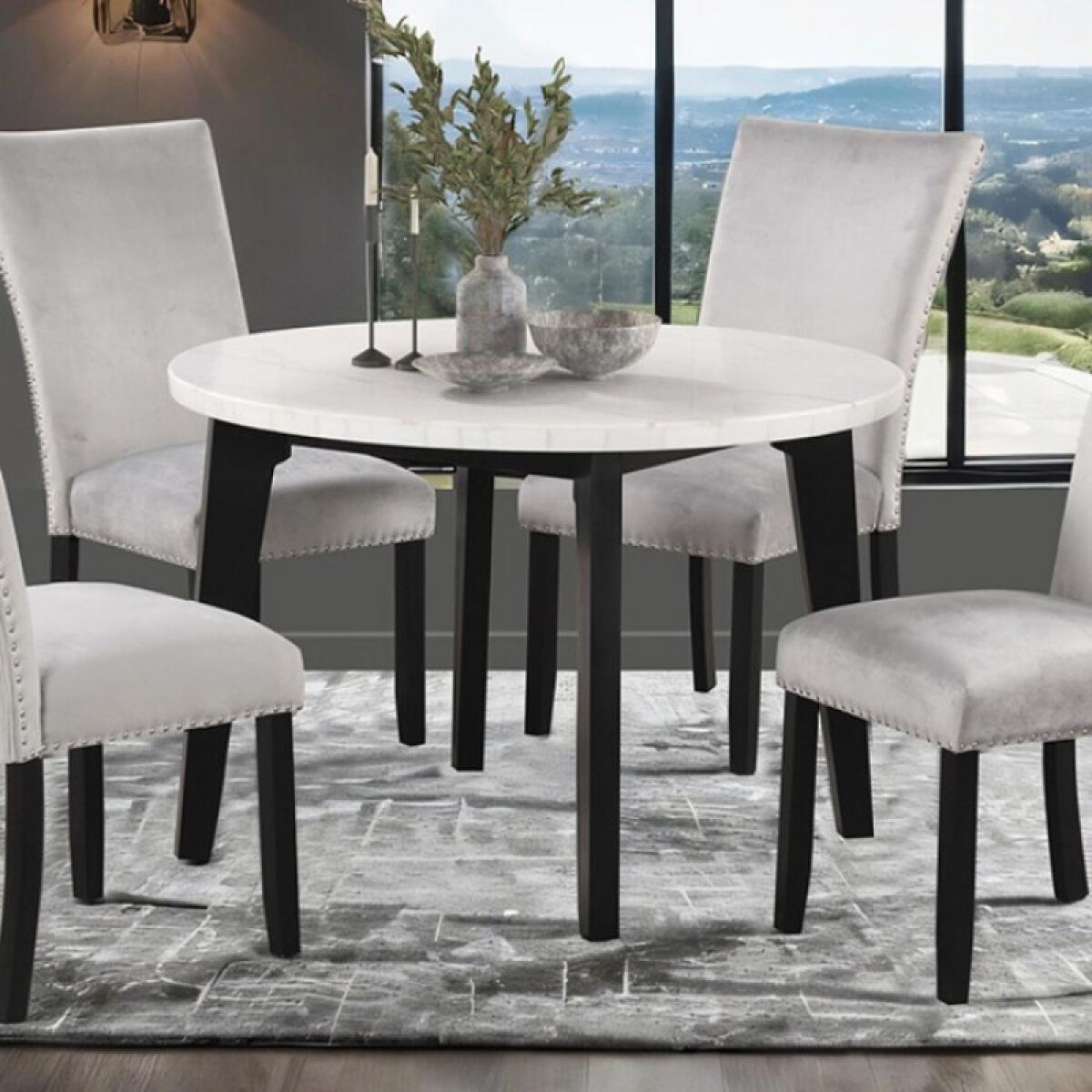 2f456b6de9f8762f88c556e88798bd47 Sabro Round Dining Table - Image 1
