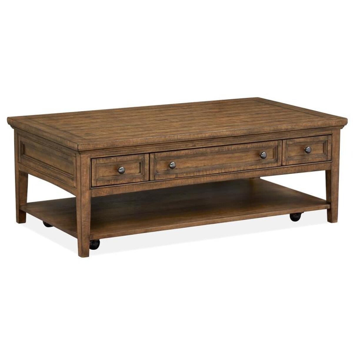 82b34f1043e538a7ead533aba8dac7b8 Bay Creek Rectangular Cocktail Table w/Casters - Image 1