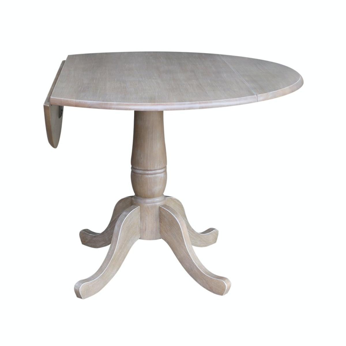 8ff0f712c6baa006326c13dbc1bbbd3f Dining Essentials - Round Drop Leaf Pedestal Table in Taupe Gray - Image 1
